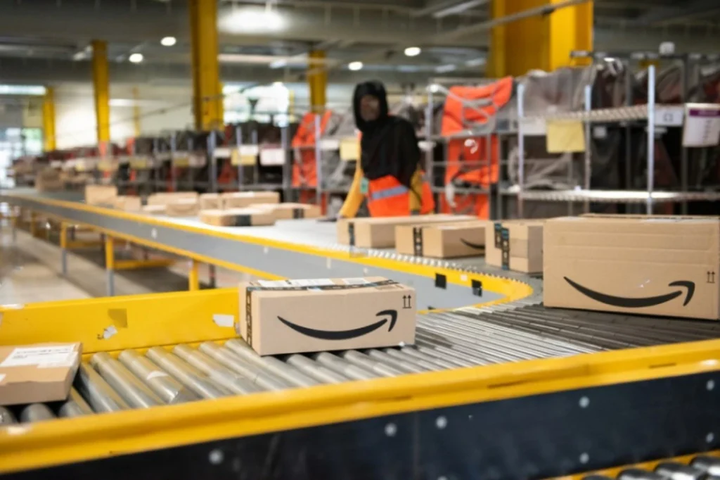 Amazon FBA packages on conveyor belt
